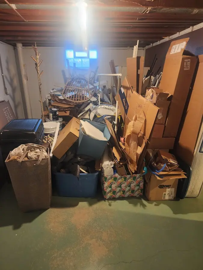 Roll-off dumpster container at job site for Concrete Dumpster Rental in Spanish Fort